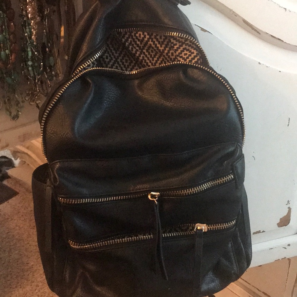 Lge backpack 5 ext pockets and several int Pockets